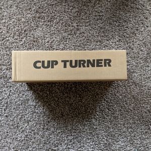 Cup turner